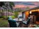 Outdoor patio with comfortable seating, perfect for relaxing and entertaining guests at 7000 14Th N St, St Petersburg, FL 33702