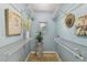 Walk-in closet with blue walls, wire shelving, and neutral tiled floor at 7000 14Th N St, St Petersburg, FL 33702