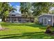 Huge backyard with a large screened patio, detached shed and fire pit at 8020 Sharon Dr, Tampa, FL 33617