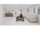 Bright living room featuring marble floors, a modern sectional, and stylish decor at 8020 Sharon Dr, Tampa, FL 33617