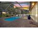 A beautiful pool with a screened enclosure to enjoy sunset swims year round at 8020 Sharon Dr, Tampa, FL 33617