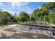 Screened pool with lush green scenery in background at 8020 Sharon Dr, Tampa, FL 33617