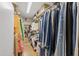 Walk-in closet features custom shelving and ample storage for clothes and accessories at 8020 Sharon Dr, Tampa, FL 33617
