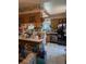 Charming kitchen featuring oak cabinets, tile floors, and standard appliances at 8119 Oak Trace Way # C, Tampa, FL 33634