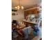 Kitchen featuring a breakfast bar, tile floors, and unique decor at 8119 Oak Trace Way # C, Tampa, FL 33634