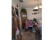 View of the office featuring a desk, oak cabinet, and chandelier at 8119 Oak Trace Way # C, Tampa, FL 33634
