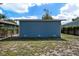 Backyard featuring a fenced perimeter and partial grass coverage at 8624 N Semmes St, Tampa, FL 33604
