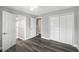 Main bedroom features new laminate floor, walk-in shower and closet at 8624 N Semmes St, Tampa, FL 33604