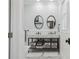 Modern bathroom with double vanity, round mirrors, and sleek fixtures for a contemporary look at 906 E Patterson St, Tampa, FL 33604