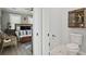 View from bedroom to bathroom with toilet and cabinet at 906 E Patterson St, Tampa, FL 33604