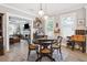 Charming dining room with stylish furnishings and seamless flow to the adjacent living area at 906 E Patterson St, Tampa, FL 33604