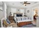 Serene main bedroom featuring a king-size bed, and hardwood floors at 906 E Patterson St, Tampa, FL 33604