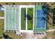 An aerial view showcasing the shuffleboard courts and tennis courts at 10029 Wellington Ave, Dade City, FL 33525