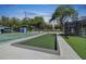 Bocce ball court with shuffle board and tennis court in background at 10029 Wellington Ave, Dade City, FL 33525