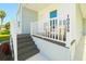 Inviting front porch with decorative address post and steps, offering a warm welcome at 10029 Wellington Ave, Dade City, FL 33525