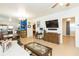 Spacious living room featuring comfortable seating, modern decor, and an open layout at 1008 E 25Th Ave, Tampa, FL 33605