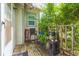 Enchanting porch shaded by lush greenery providing a serene outdoor retreat to relax at 1008 E 25Th Ave, Tampa, FL 33605