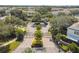 Secured entry gates with landscaped median leading to community parking at 10135 Post Harvest Dr, Riverview, FL 33578