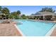 Enjoy this large community pool with a covered lounging area, perfect for relaxing and soaking up the sun at 10135 Post Harvest Dr, Riverview, FL 33578
