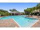 Take a dip in this refreshing community pool, complete with lounge chairs and a covered area for shade at 10135 Post Harvest Dr, Riverview, FL 33578