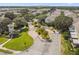 Street view of the community with manicured landscaping and winding roads at 10135 Post Harvest Dr, Riverview, FL 33578