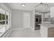 Open-concept kitchen area with granite countertops and stainless steel appliances at 10218 Lola St, Tampa, FL 33612