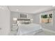 Comfortable bedroom with neutral tones, stylish furnishings and ample natural light at 10218 Lola St, Tampa, FL 33612