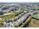 Expansive aerial view of the residential neighborhood, showcasing its community layout at 11443 Cay Spruce Way, San Antonio, FL 33576