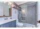 Modern bathroom featuring a glass enclosed shower and beautiful vanity with contemporary finishes at 1240 Georgia Ave, Dunedin, FL 34698