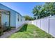 Backyard with a privacy fence and grass at 1240 Georgia Ave, Dunedin, FL 34698
