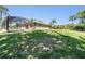 The backyard is perfect for entertaining with a screened in pool and patio at 12801 Castlemaine Dr, Tampa, FL 33626