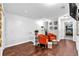 Upstairs landing featuring hardwood floors, seating, and decorative accents at 12913 Dream Catcher Way, Riverview, FL 33579