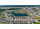 An aerial view showcases this Primary planned community with stunning ponds throughout at 13246 Twin Bridges Dr, Riverview, FL 33579