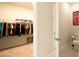 Organized walk-in closet with ample storage space for clothes and accessories, adding convenience and value to the home at 13246 Twin Bridges Dr, Riverview, FL 33579
