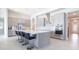 Modern kitchen showcasing stainless steel appliances, a kitchen island, and ample countertop space for meal preparation at 13246 Twin Bridges Dr, Riverview, FL 33579