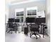 Home office featuring natural light, multiple workstations, and streamlined design, ideal for remote work and study at 13246 Twin Bridges Dr, Riverview, FL 33579