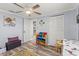 Bedroom with hardwood floors, ceiling fan, and ample storage options for your needs at 1344 Dartmouth Dr, Holiday, FL 34691