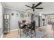 Dining area adjacent to kitchen and living areas with a view to the outside at 1344 Dartmouth Dr, Holiday, FL 34691