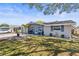 Well-maintained home with a manicured lawn, and fresh exterior paint at 1344 Dartmouth Dr, Holiday, FL 34691