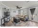 Cozy living room with a comfortable sectional couch and modern decor at 1344 Dartmouth Dr, Holiday, FL 34691