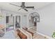 Spacious room boasts an open layout with hardwood floors and lots of natural light at 1344 Dartmouth Dr, Holiday, FL 34691