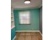 Cozy bedroom featuring neutral walls, tiled floors and a window providing natural light at 13833 Orange Sunset Dr # 201, Tampa, FL 33618