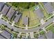 Aerial view captures large lawns and manicured landscaping in a residential community at 13871 Carlow Park Dr, Riverview, FL 33579