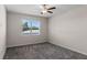 Bright bedroom with a ceiling fan, a large window and neutral colors at 13871 Carlow Park Dr, Riverview, FL 33579