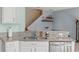 Modern kitchen with neutral countertops and stainless steel appliances at 14418 Mirabelle Vista Cir, Tampa, FL 33626