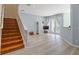 Spacious living room with hardwood floors and access to an outdoor patio at 14418 Mirabelle Vista Cir, Tampa, FL 33626