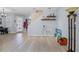 Spacious living room featuring wood floors, staircase, and a cozy atmosphere at 14418 Mirabelle Vista Cir, Tampa, FL 33626