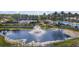 Community water feature surrounded by the tennis courts and community pool at 14418 Mirabelle Vista Cir, Tampa, FL 33626