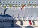 Overhead view of townhome complex shows roof and assigned parking spaces for each unit at 17960 Gulf Blvd # 111, Redington Shores, FL 33708