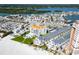 Panoramic aerial view showcases beachfront condos, pool, and intracoastal waterways at 17960 Gulf Blvd # 111, Redington Shores, FL 33708
